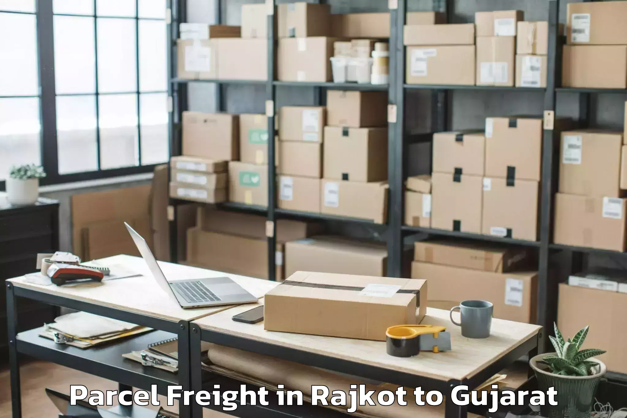 Rajkot to Jhalod Parcel Freight Booking